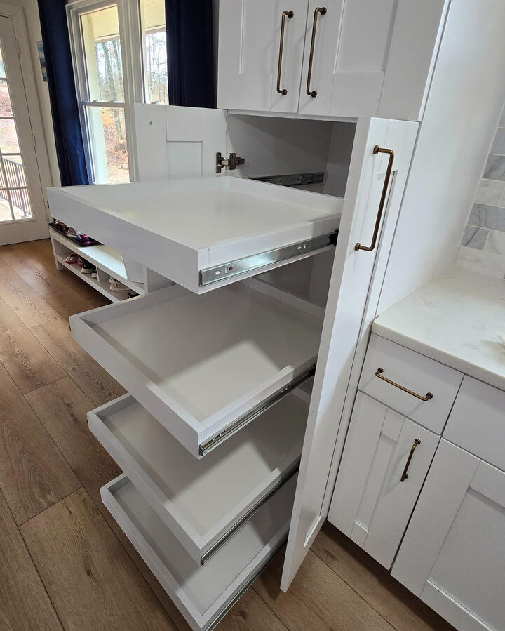Making spaces more functional, one pantry at a time! Jesse took the existing shelves, built them into boxes and added glides. Now, the entire depth of the drawers are usable and accessible!